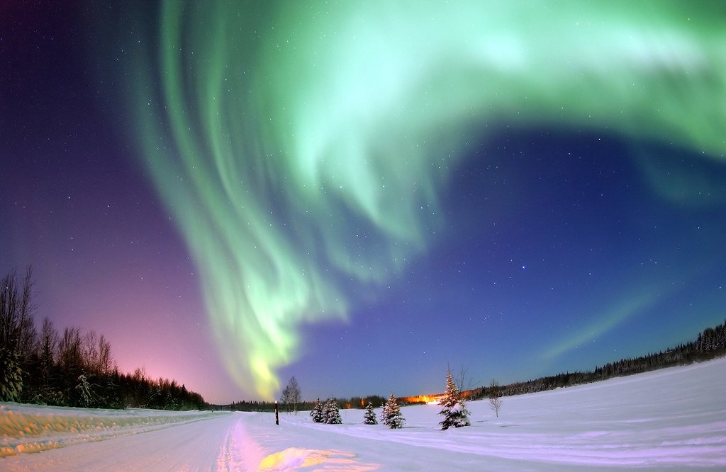 Aurora Borealis, the colored lights seen in the skies around the North Pole, the Northern Lights, from Bear Lake, Alaska